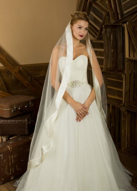 Velo da sposa online shop lunghezza media e bordo finale in raso color avorio