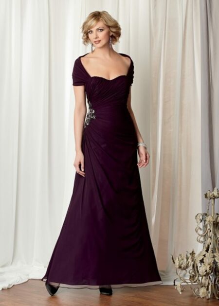 Abito da cerimonia per cinquantenni elegante fatto in chiffon drappeggiato lateralmente con spalline rimovibile e punti luci