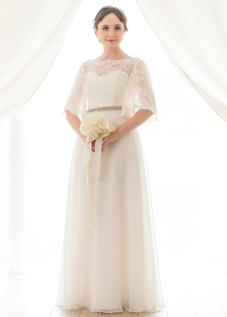 Online wedding dress made in Italy with lace bodice and chiffon skirt, half bell sleeves and sequin belt and sparkling stones.