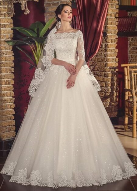 Abito da sposa scintillanti fatto in tulle e raso decorato totalmente con pizzo e perline e tanti punti luci