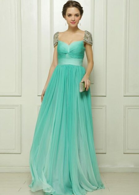 Abito per testimone di nozze molto elegante colore verde tiffany fatto in tulle con gonna lunga e morbida