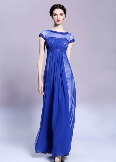 Vestito blu elettrico lungo con trasparenze sulle spalle e maniche fatto in tulle