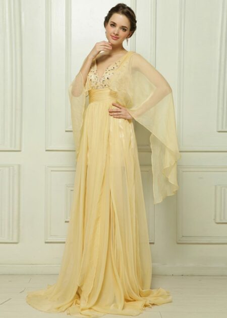 Vestito da cerimonia per signore colore giallo con maniche lunghe a farfalla